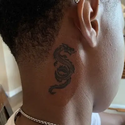 dragon behind the ear tattoo