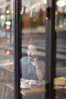 French woman in a cafe