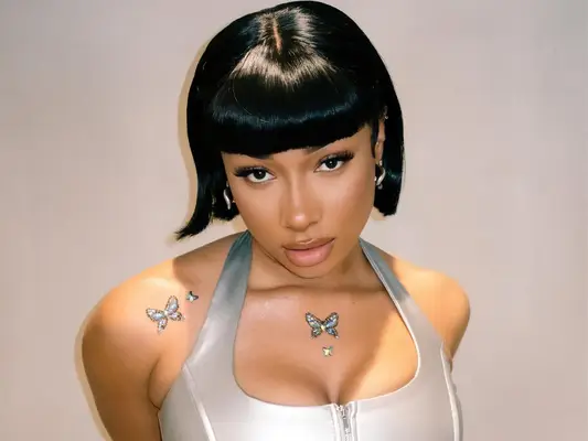 Realistic butterfly tattoo on shoulder