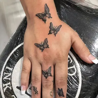 butterfly hand tattoo