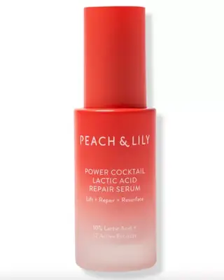 Peach & Lily Repair Serum on white background