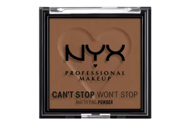 applying the e.l.f. Cosmetics Halo Glow Setting Powder to forehead