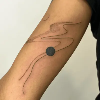 tiny outline palm tree tattoo in black an white on arm