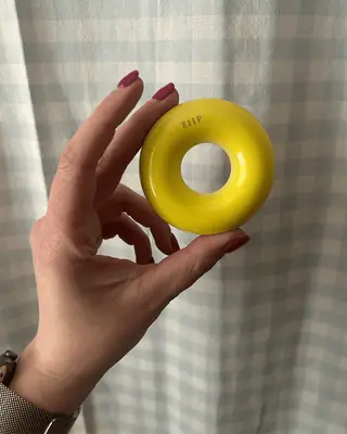 the author holding the Ziip Dot