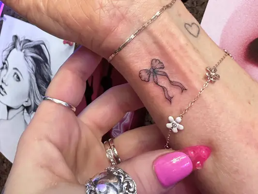 Image of small tattoos on a wrist