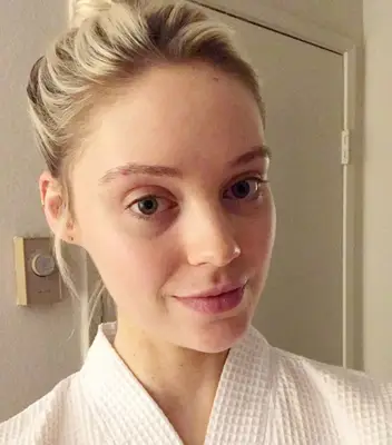 Erin Jahns selfie with topknot and no makeup