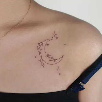 simple outlined crescent moon tattoo