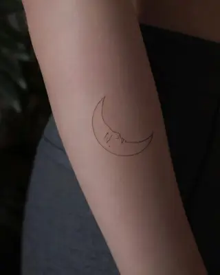 crescent moon with face