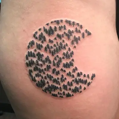 crescent moon composed of trees