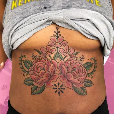 Tattoos on Dark Skin Floral Sternum