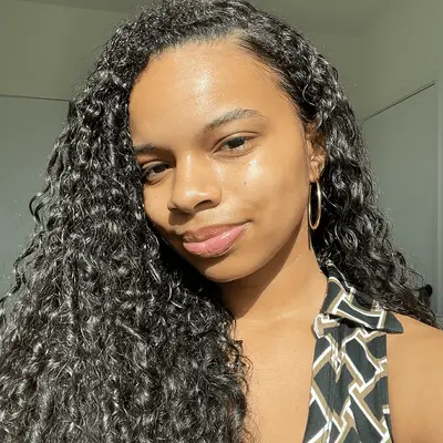 woman wearing Glow Recipe Dew Balm SPF