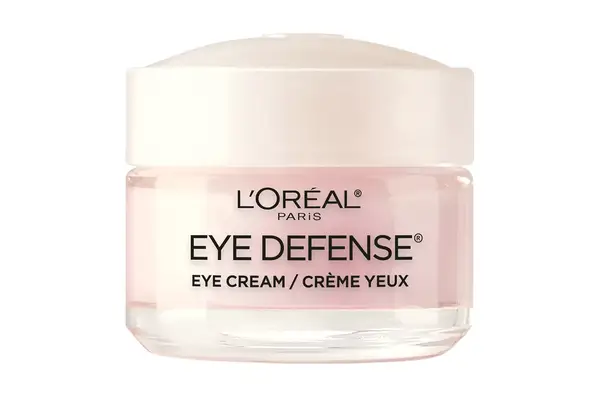 Person applying ILIA Bright Start Retinol Alternative Brightening Eye Cream