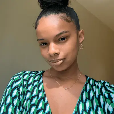 MYM Beauty editor wearing Merit The Uniform tinted sunscreen