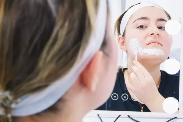 Cetaphil Dermacontrol Purifying Clay Face Mask with Bentonite Clay on a beige and purple background