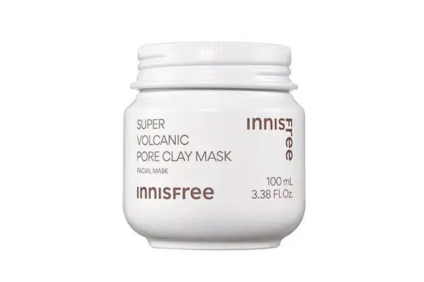 Person applying a skincare product above their upper lip 