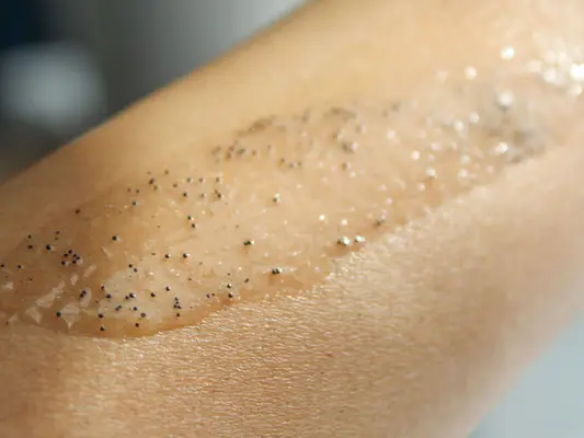 Person tests Osea Salts of the Earth Body Scrub on their hand