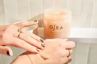 Person tests Osea Salts of the Earth Body Scrub on their hand