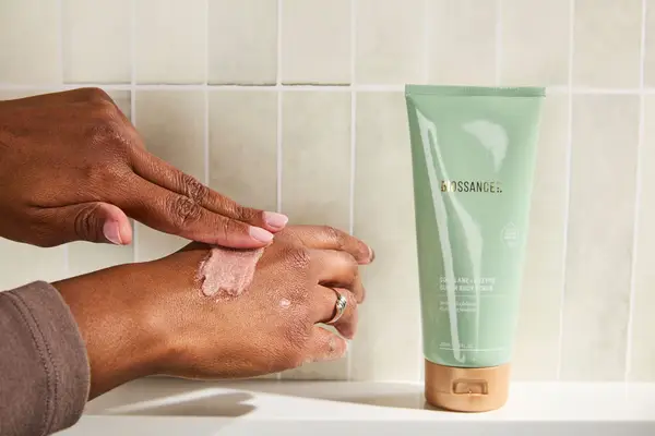 Person tests Biossance Squalane + Enzyme Sugar Body Scrub on their hand