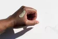 Dollop of Aztec Secret Indian Healing Clay on the back of a hand