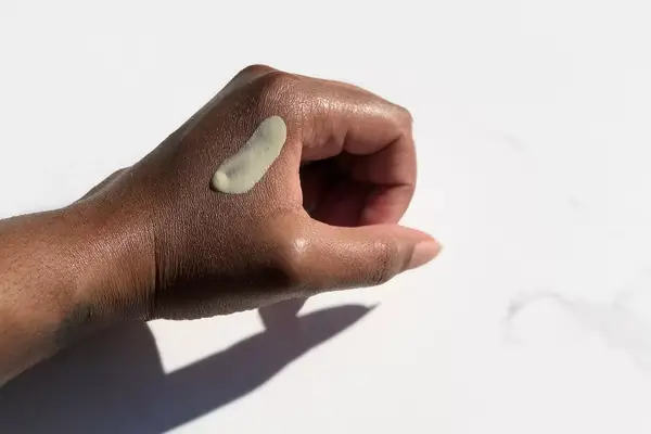 Dollop of Aztec Secret Indian Healing Clay on the back of a hand