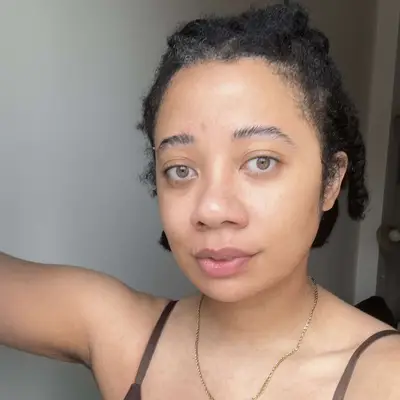 MYM Beauty editor Star Donaldson with fresh, radiant skin and a braided hairstyle