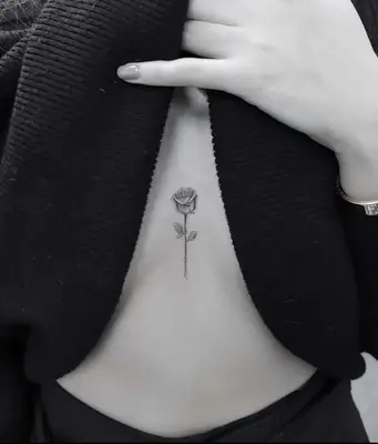 A rose tattoo on a person