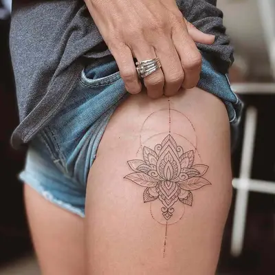 Close up of a mandala thigh tattoo