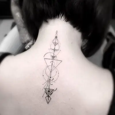 Minimalist neck/back tattoo