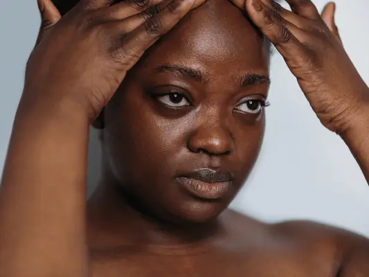 black woman with glowing skin