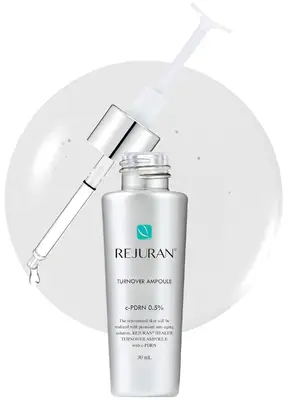 A skincare serum bottle labeled 