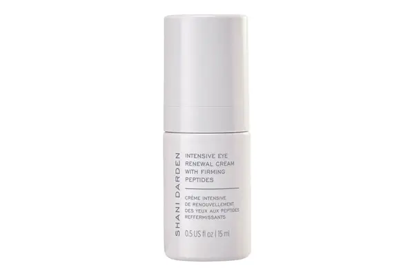 Kate Somerville +Retinol Firming Eye Cream against a gray background