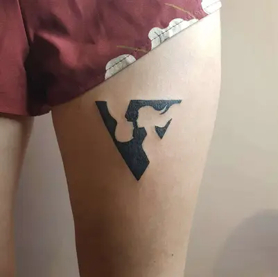 Minimalist triangle Negative Space Tattoo with male and female profile figures