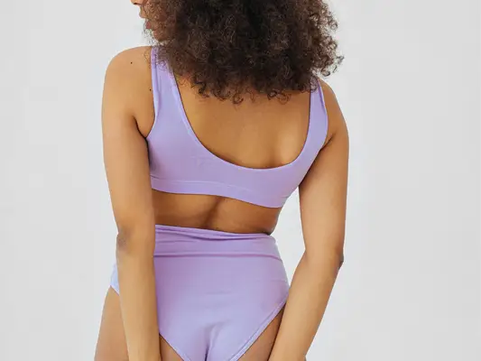 woman in purple undergarnments