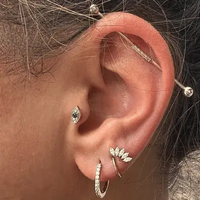 Ear with industrial piercing