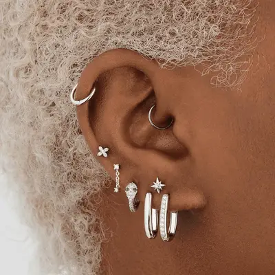 Silver hoop daith piercing