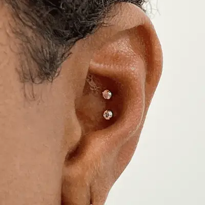 Snakebite conch piercing