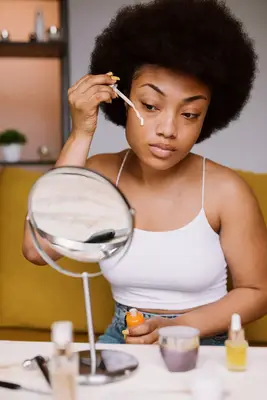 person doing skincare regimen