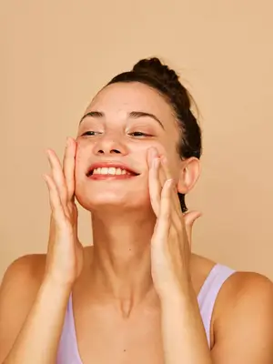 happy person using lite moisturizer