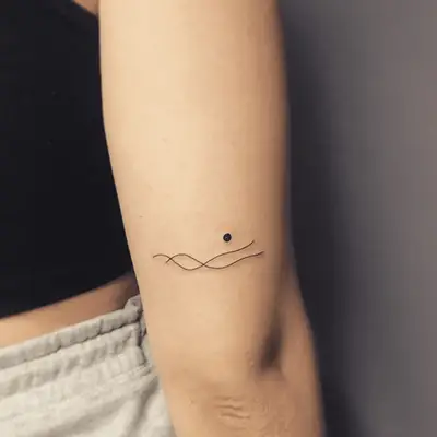 tattoo of an abstract mountain and moon