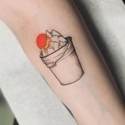 bucket full of mountains tattoo
