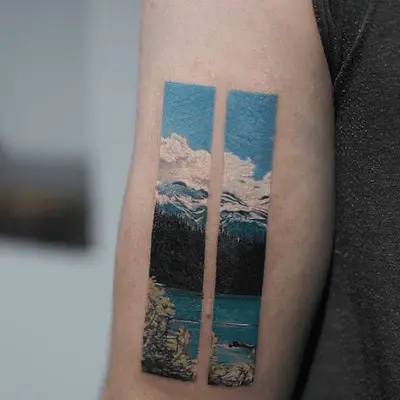 tattoo that looks like windows looking on to mountains