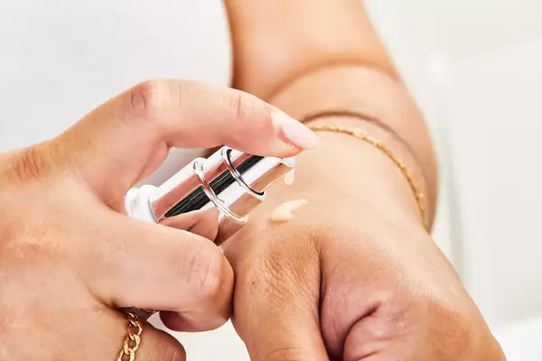 A person applies Environâs Skin EssentiA Antioxidant & Peptide Eye Gel