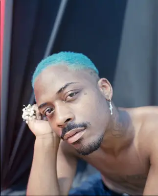 portrait of young person with blue hair