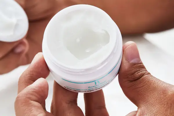 Tatcha the Water Cream being scooped from the jar