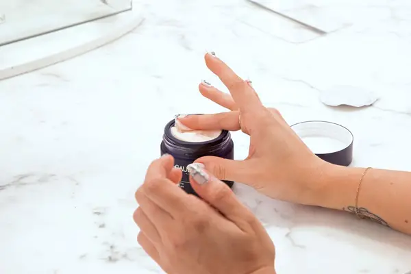 SkinCeuticals Triple Lipid Restore 2:4:2 on the back of a person