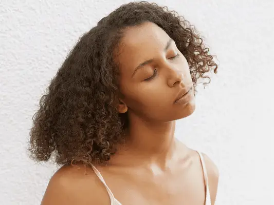 Beauty portrait of a black woman with curly hair