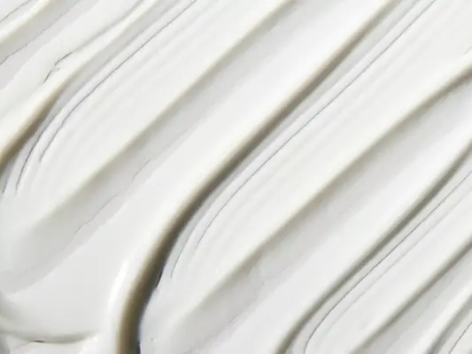 Close up of white skincare cream product.