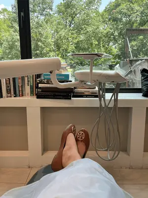 woman in dentist chair overlooking central park
