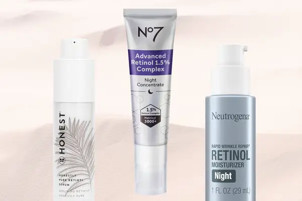 A side-by-side selection of drugstore retinol creams, including Honest Beauty, No7, and Neutrogena, on a colorful background