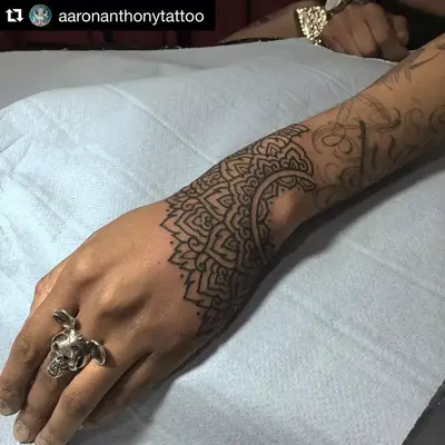 Mandala tattoo on hand and wrist